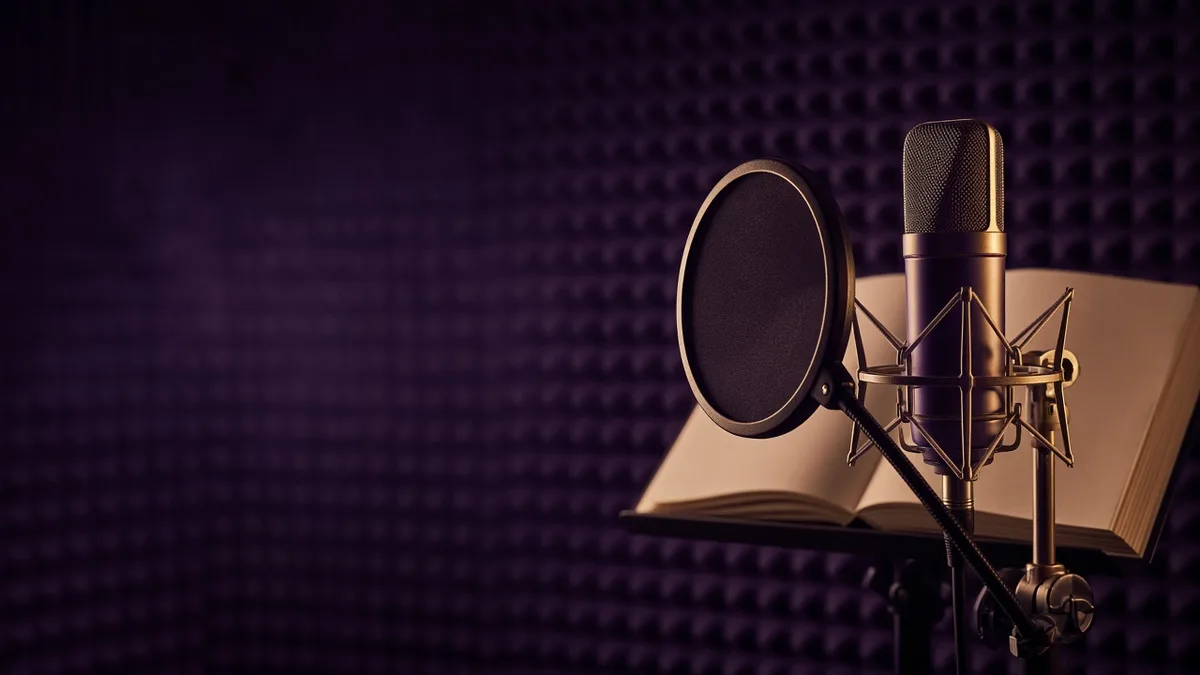 Studio microphone in front of an open book
